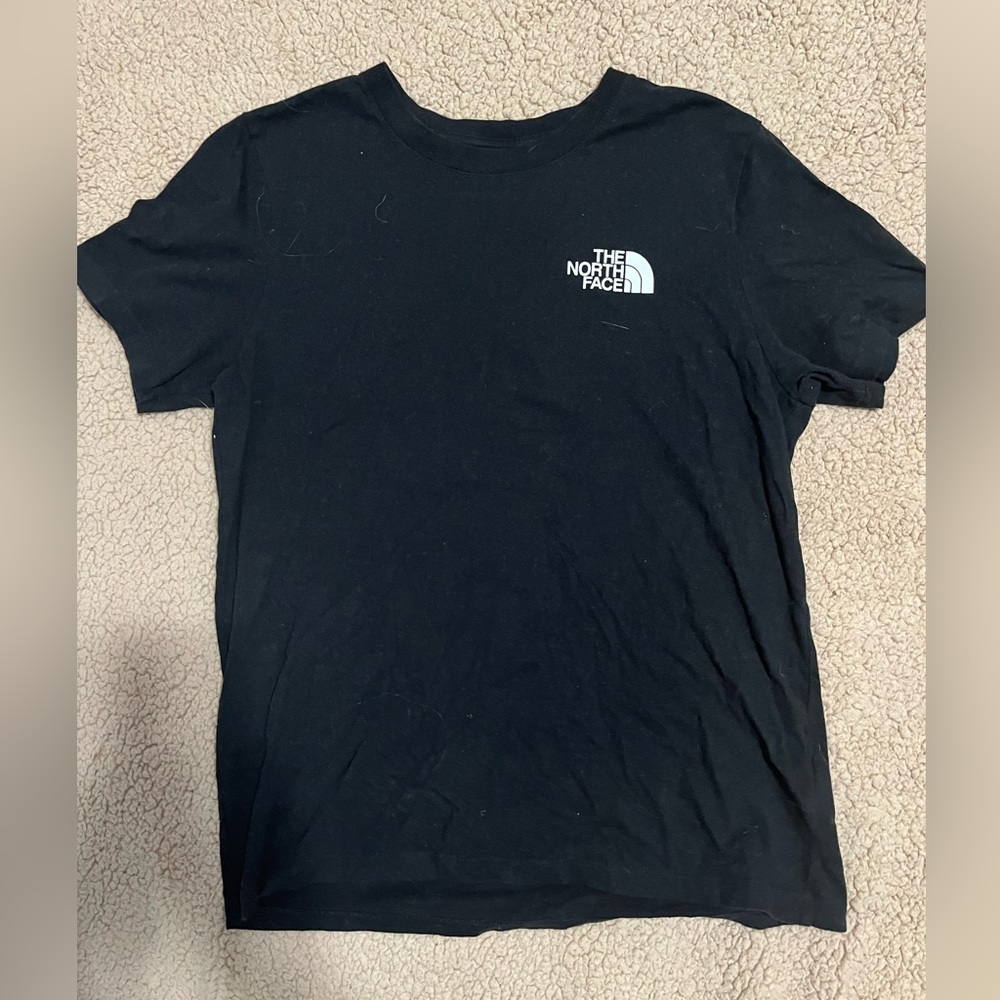 black North Face tee